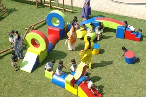 a group of children playing in a playground